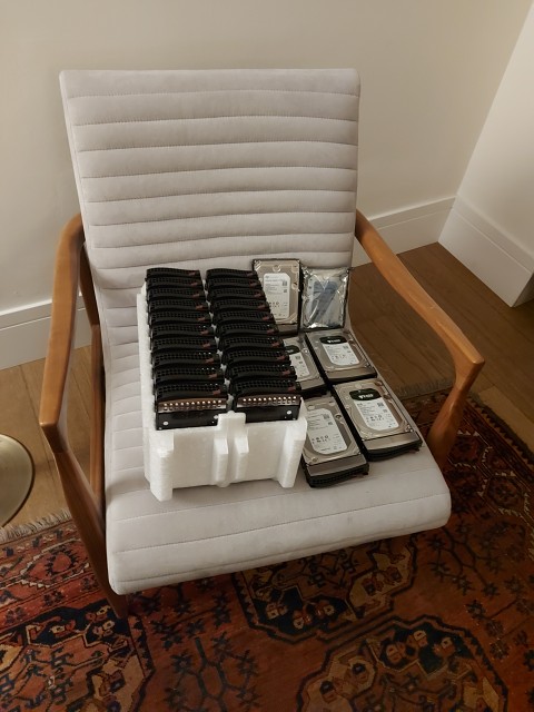 20231017 194905 - My Hotel Room After Grabbing A Bunch Of Old Drives From Datacentre